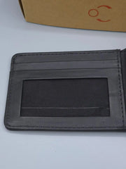 Black leather wallet with card slots on a light gray background