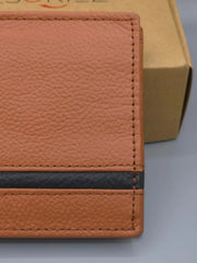 Close-up of a brown leather wallet with a visible brand logo on a gray surface.