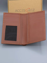 Brown leather wallet with a black card pocket on a gray background, branded 'Accesoriz'.