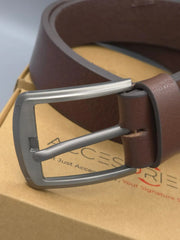Brown leather belt with silver buckle on a box background