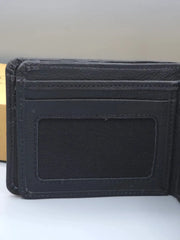 Black wallet with a card holder on a light gray background